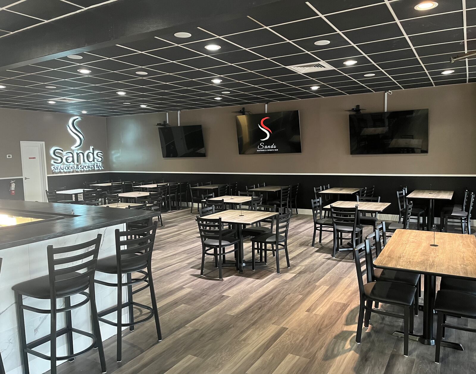 Sands Seafood and Sports Bar plans to offer the best of both worlds with a cross between a sports bar and a high-dining experience when it opens in August. CONTRIBUTED