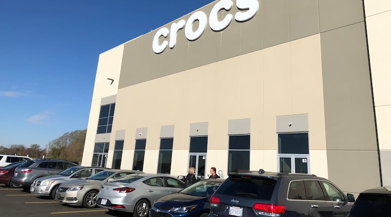 Crocs relocated its distribution operation from Ontario, Calif. to a site near Dayton International Airport. The footwear company officially kicked off opening on Wednesday with a ribbon cutting ceremony and party for employees. STAFF/BONNIE MEIBERS