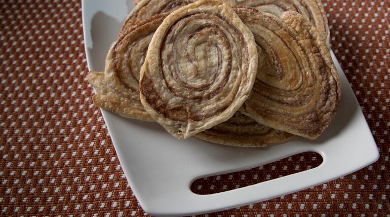 Either known as arlettes in Britain or elephant ears in the U.S., it doesn't much matter what you call these crisp and flaky wafers of sugary, cinnamony, buttery pastry, which is a little challenging to make, but entirely achievable. (Jerry Holt/Minneapolis Star Tribune/TNS)