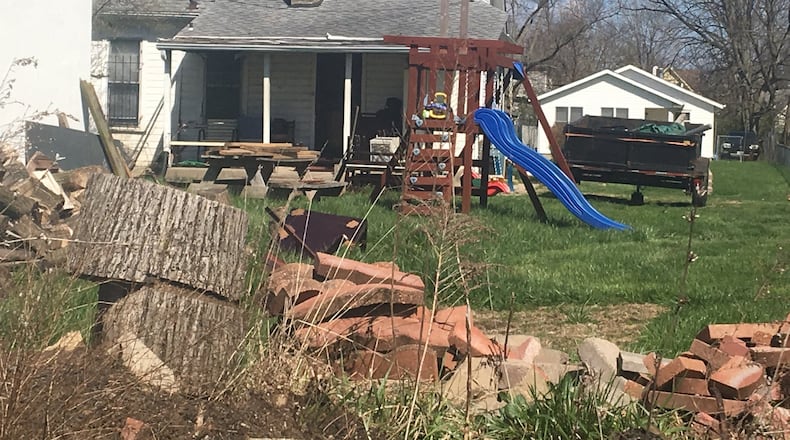 The backyard of a home at 345 Middle St. where a dog that was chained up broke free of its restraint and attacked and killed 60-year-old Maurice Brown.