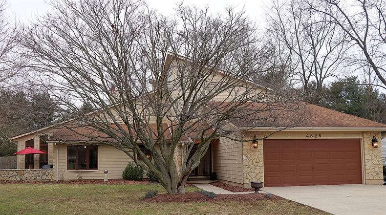 On the market for $409,000, the cedar two-story house at 4825 Horseman Drive in Bath Twp. has about 2,748 square feet of living space. CONTRIBUTED PHOTOS BY KATHY TYLER