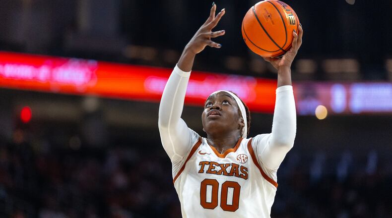 Texas center Kyla Oldacre (00) goes up to score against Southeastern Louisiana during the second half of an NCAA college basketball game Sunday, Dec. 28, 2025, in Austin, Texas. (AP Photo/Stephen Spillman)