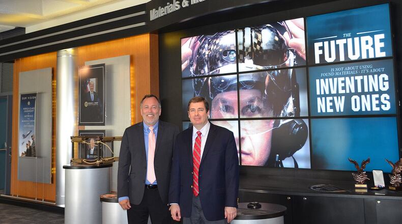 Doug Carter (left), and Dr. Dean Evans were recently named Air Force Research Laboratory fellows for their scientific and engineering achievements. (U.S. Air Force photo/Donna Lindner)