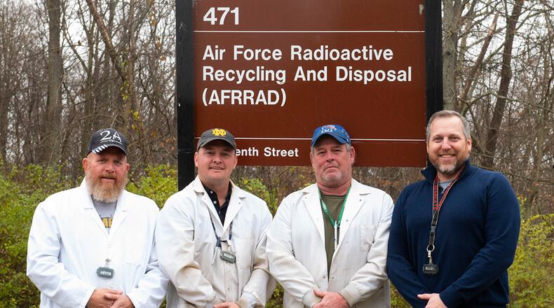 The Air Force Radioactive Recycling and Disposal team stands outside its facility on Wright-Patterson Air Force Base. It won the 2022 Secretary of Defense Environmental Award for Environmental Quality. U.S. AIR FORCE PHOTO/JAIMA FOGG
