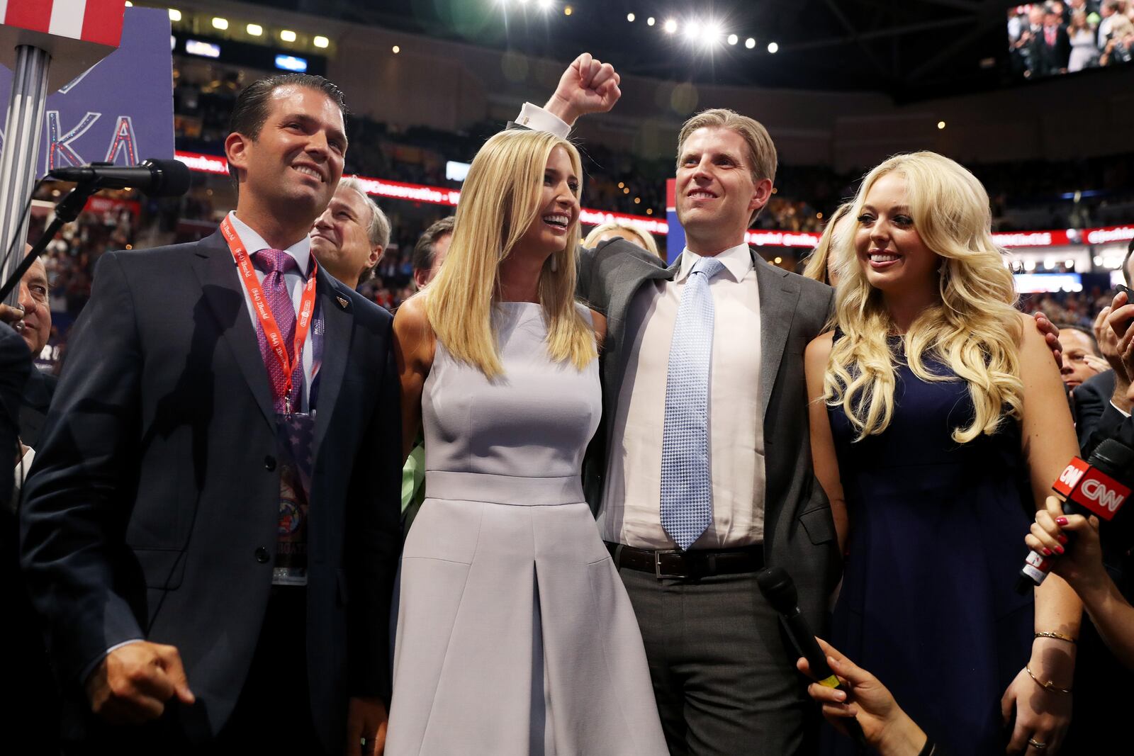 CLEVELAND, OH - JULY 19: Donald Trump Jr. (L), along with Ivanka Trump (C), Eric Trump (2nd-R) and Tiffany Trump (R), take part in the roll call in support of Republican presidential candidate Donald Trump on the second day of the Republican National Convention on July 19, 2016 at the Quicken Loans Arena in Cleveland, Ohio. An estimated 50,000 people are expected in Cleveland, including hundreds of protesters and members of the media. The four-day Republican National Convention kicked off on July 18. (Photo by Joe Raedle/Getty Images)