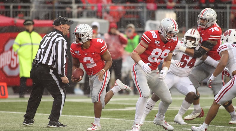 Ohio State’s J.K. Dobbins runs for a touchdown against Wisconsin on Saturday, Oct. 26, 2019, at Ohio Stadium in Columbus. David Jablonski/Staff