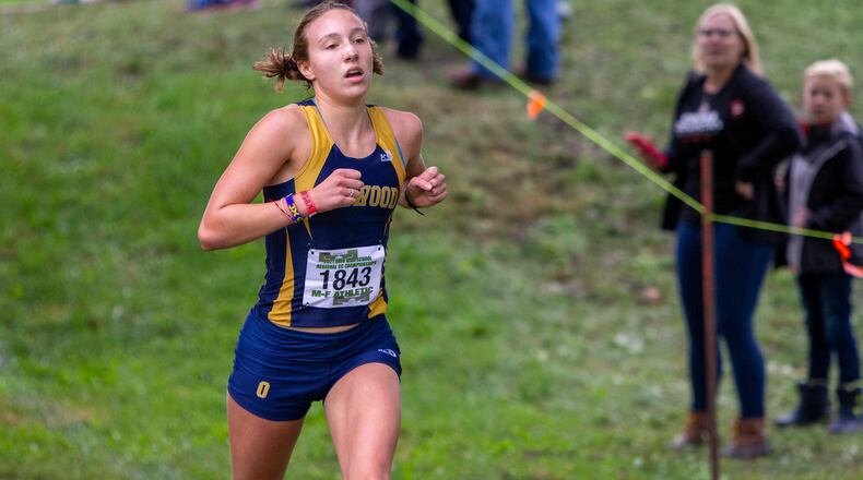 Oakwood senior Grace Hartman won her fourth Division II regional race Saturday in Troy and led her team to the state meet. She will defend her state title next Saturday in Columbus. Jeff Gilbert/CONTRIBUTED