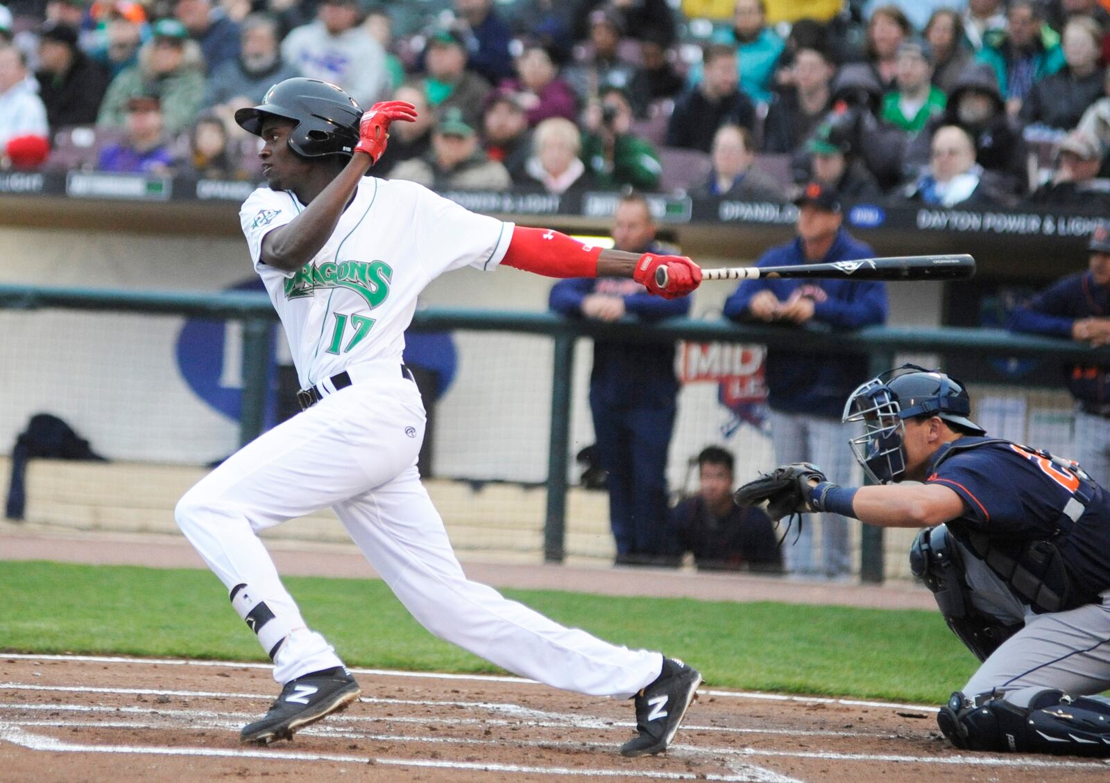 Dragons outfielder Mariel Bautista gets a first-inning hit. MARC PENDLETON / STAFF