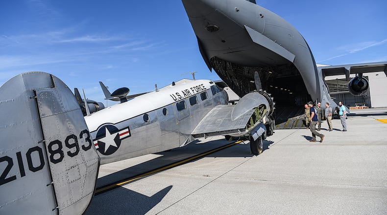 A 445th Airlift Wing C-17 Globemaster III transported a historic C-45H aircraft loaned by the National Museum of the U.S. Air Force to the Museum of Aviation at Robins Air Force Base, Georgia, Oct. 1. U.S. AIR FORCE PHOTO/MASTER SGT. PATRICK O’REILLY