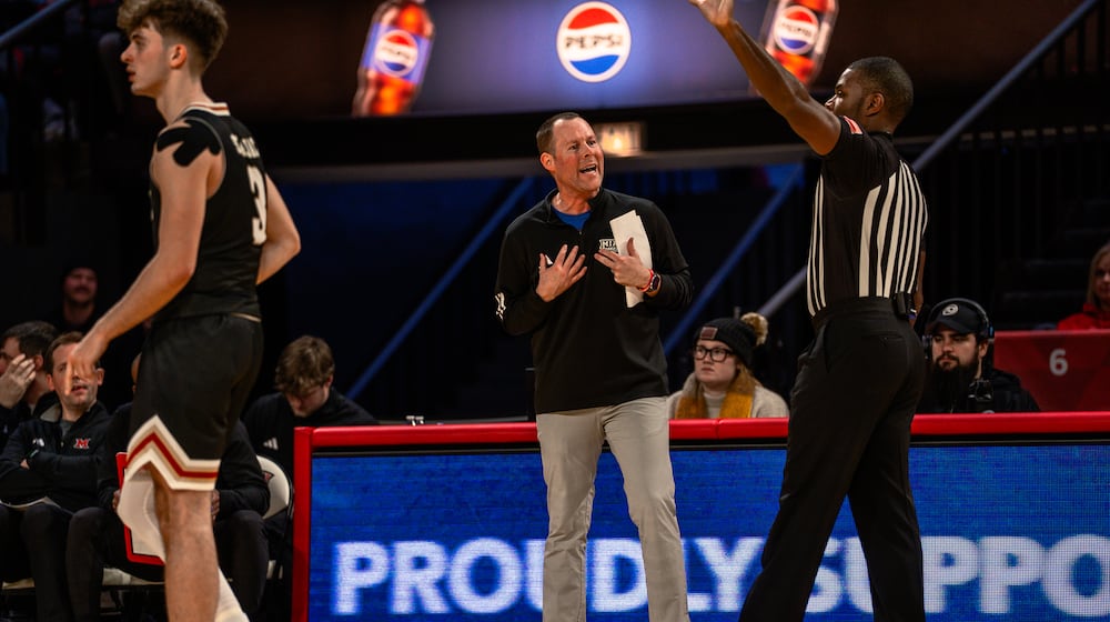 Miami University men’s basketball coach Travis Steele speaks to an official during their game against Akron on Saturday, Jan. 3, 2026 at Millet Hall in Oxford. WILL MIKLAUTSCH / CONTRIBUTED PHOTO