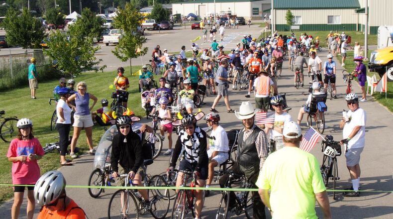 A 20-year visionary plan for Greene County bicycle trails recommends building more roadway sidepaths or trails, which are considered safer than separate bike lanes next to motor traffic.