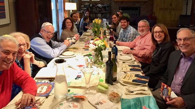 Seders are typically large gatherings of family and friends. Pictured, the Katz Seder last year. This year they will gather via FaceTime. CONTRIBUTED PHOTO