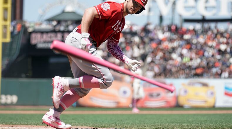 May 12, 2019; San Francisco, CA, USA; Cincinnati Reds third baseman Nick Senzel (15) tosses the bat against the San Francisco Giants during the fifth inning at Oracle Park. Mandatory Credit: Stan Szeto-USA TODAY Sports