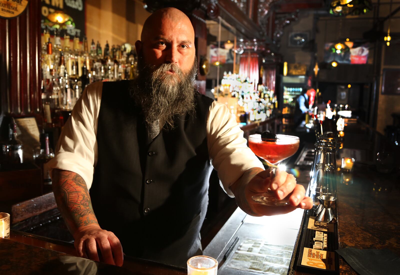 Century Bar co-owner Joseph Head with the Summer Cocktail "Remember the Maine," made with Rye Whiskey, Cherry Liqueur, Bitters, Bulleit Rye and Sweet Vermouth. JIM WITMER/STAFF
