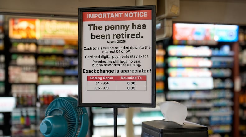 FILE - A sign in a Kwik Trip store shows the store will no longer be using pennies to give change, on Oct. 23, 2025, in Yorkville, Wis. (AP Photo/Morry Gash, File)