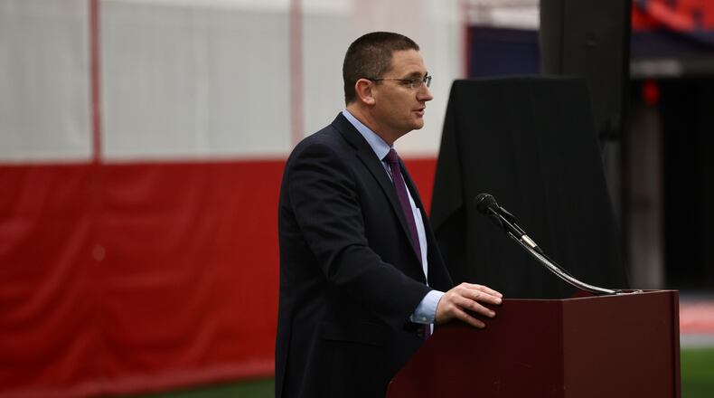 Dayton AD Neil Sullivan speaks during a dedication of the Owens Training Facility at Dayton's Cronin Center on Tuesday, April 18, 2023. David Jablonski/Staff