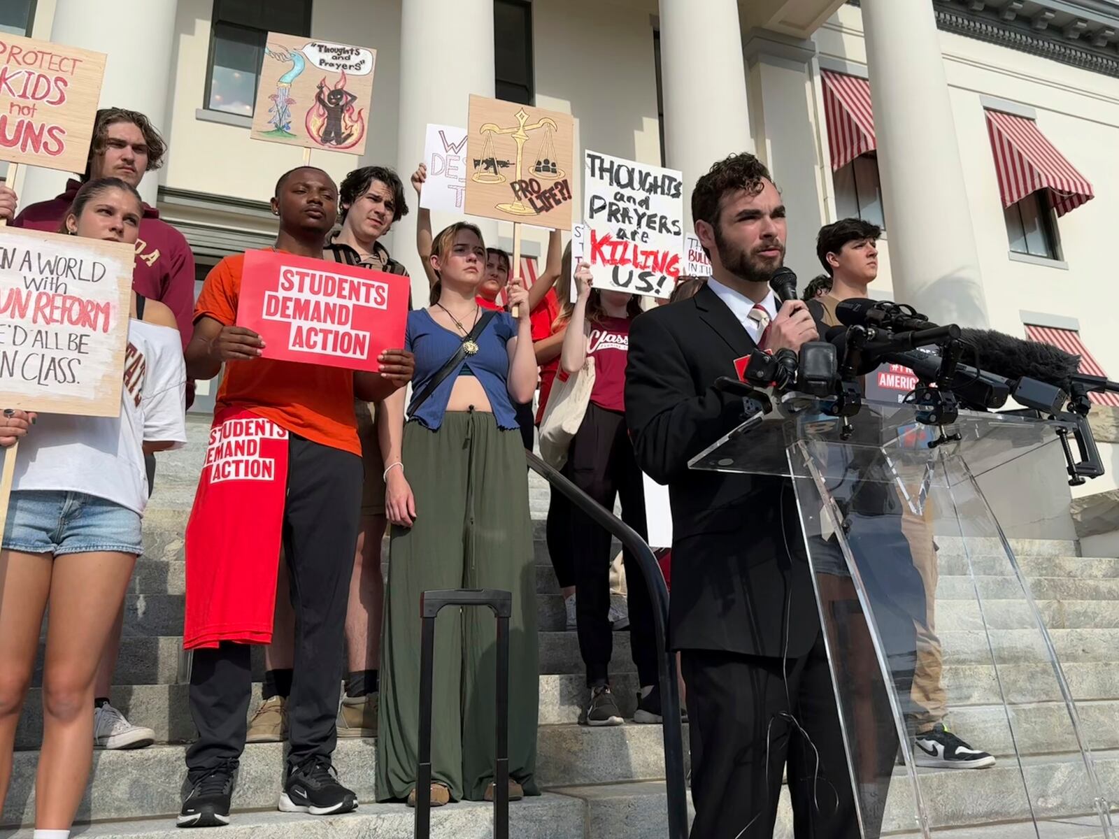 Logan Rubenstein, a 21-year-old junior at Florida State University, speaks at a rally in support of gun control policies on the steps of Florida's historic old capitol on Wednesday, April 23, 2025 in Tallahassee, Fla., less than a week after a deadly shooting on FSU's campus. Rubenstein is also a graduate of Marjory Stoneman Douglas High School in Parkland, Fla., where 17 people were killed in 2018 in what is considered one of the country's deadliest mass shootings. (AP Photo/Kate Payne)