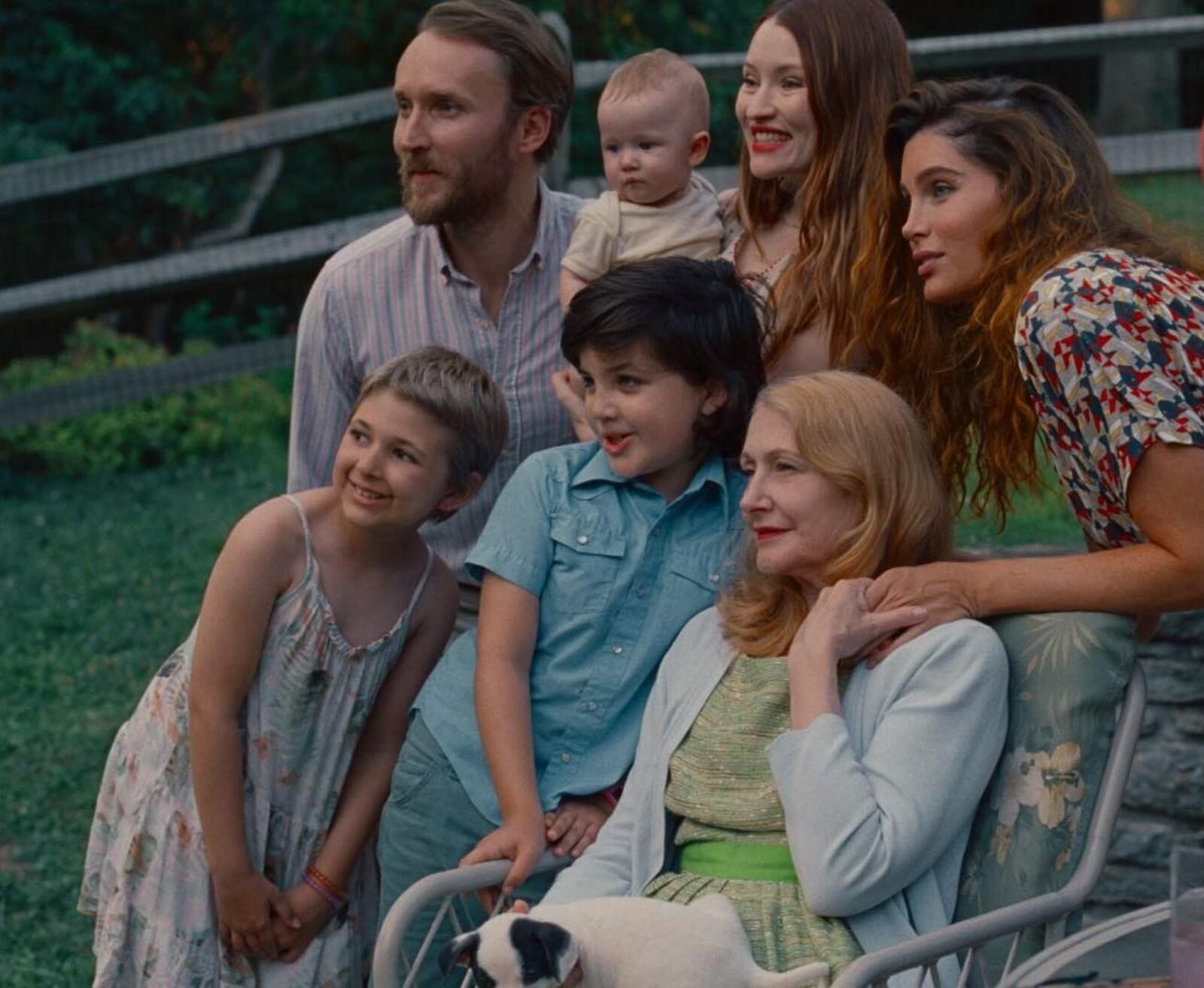 Trace Lysette (top right as Monica), Patricia Clarkson (seated as Eugenia), Emily Browning (top middle as Laura), Joshua Close (top left as Paul), Graham Caldwell (bottom middle as Brody), and Ruby James Fraser (bottom left as Britney) in "Monica." Photo courtesy of IFC Films. An IFC Films Release.