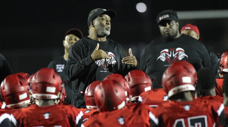 Trotwood-Madison’s Jeff Graham talks to the team after a loss to Pickerington Central on Friday, Sept. 7, 2018, in Trotwood. David Jablonski/Staff