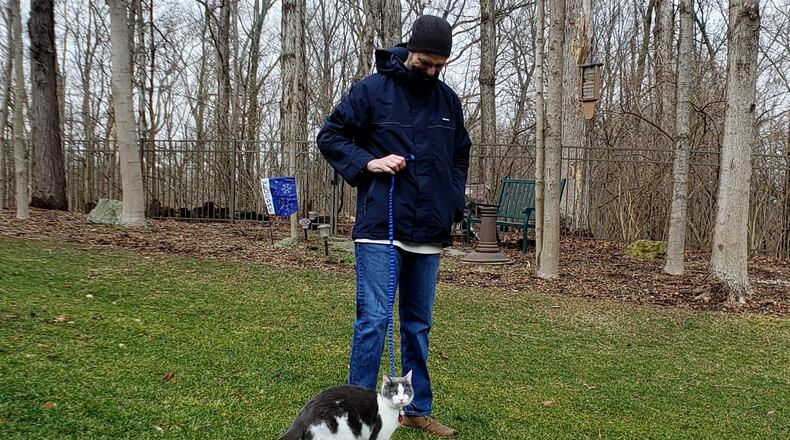Pip and Ed wandering in their backyard. KARIN SPICER