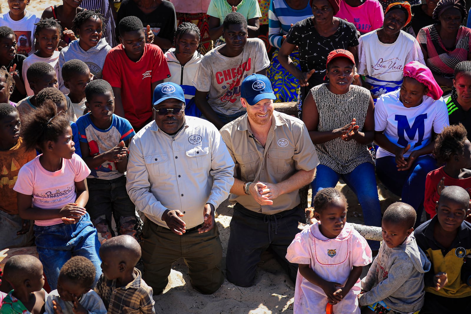 Britain's Prince Harry attends a safety class for children as part of his visit to see the work of landmine clearance charity of the Halo Trust, in Cuito Cuanavale, Cuando province, southern Angola, Wednesday, July 16, 2025. (Ampe Pedro/The Halo Trust via AP)