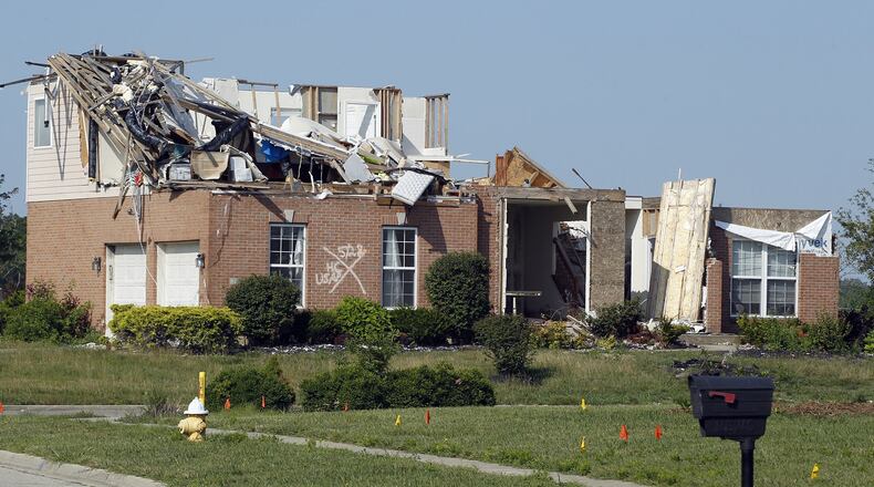 Tornado damaged home in Moss Creek development, Trotwood. Many homes in this former golf course were destroyed by the Memorial Day tornado. TY GREENLEES / STAFF