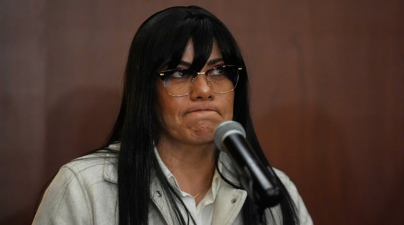 Vanesa Guzman Sanchez, the partner of Juan Pedro Saldívar Farías, who was detained and sent by Mexican authorities to the US without formal extradition proceedings, gives a press conference in Mexico City, Monday, Jan. 26, 2026. (AP Photo/Fernando Llano)