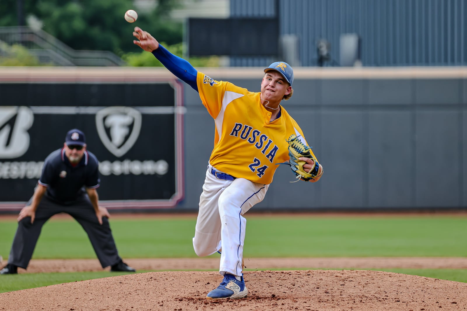 Russia High School senior Braylon Cordonnier delivers a pitch during their Division VII state semifinal game against Minster on Thursday, June 12, 2025 at Canal Park in Akron. The Wildcats won 5-3. MICHAEL COOPER / STAFF