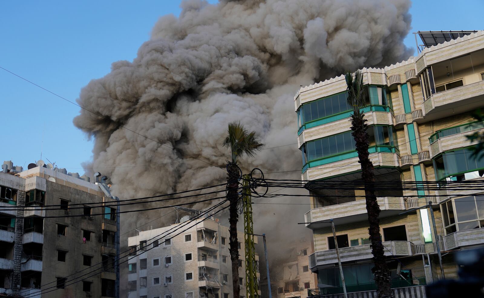 Smoke rises after an Israeli airstrike in Dahiyeh, the southern suburb of Beirut, Lebanon, Sunday, April 27, 2025. (AP Photo/Hussein Malla)