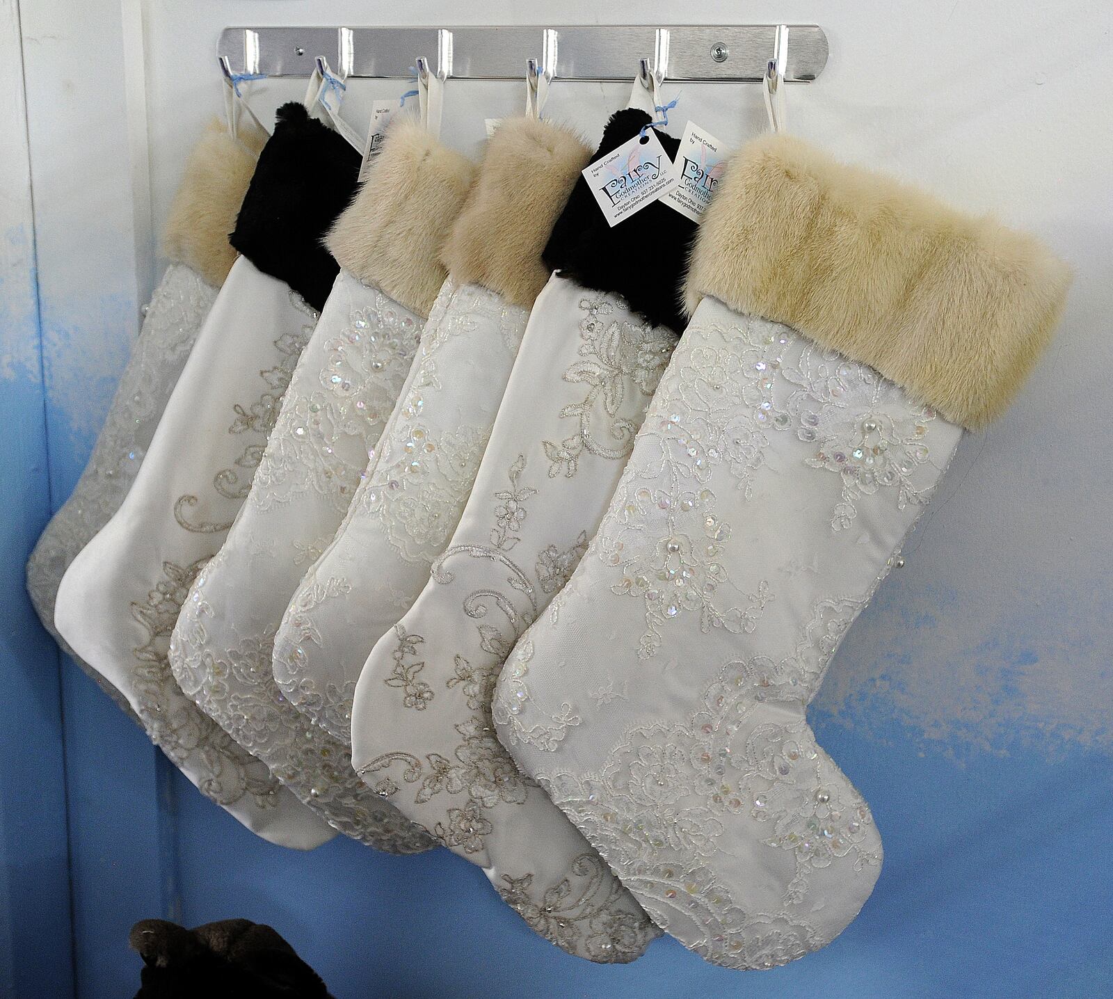 Fairly Godmother Creations takes old garments and wedding gowns and turns them into
christening gowns and first communion outfits. They also make memory bears, stuff animals ,quilts and even boutonnieres. MARSHALL GORBY\STAFF
