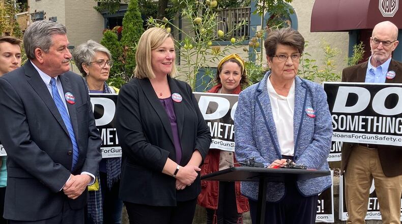 Montgomery County Auditor Karl Keith, left; Dayton Mayor Nan Whaley, center; and state Sen. Peggy Lehner, speak in the Oregon District on Friday at the launch of their “Do Something” campaign. Ismail Turay Jr./Staff