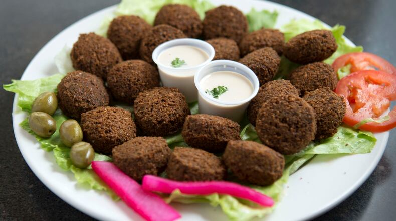 You may have to wait, but you’ll thrill when the counter guy calls your name and constructs your bespoke falafel with fresh and pickled vegetables and a selection of sauces in an oven-fresh pita. (4150 Old Milton Parkway, Alpharetta. 770-777-0193, jerusalembakeryandgrill.com)