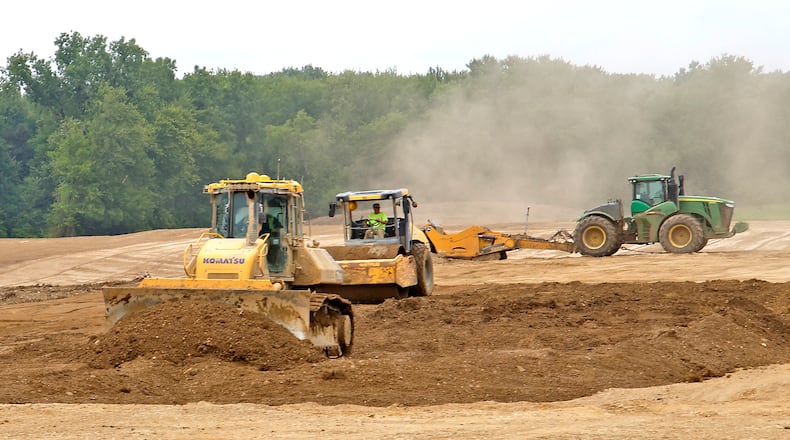 Construction for the Sycamore Ridge Housing Development at the intersection of South Burnett Road and Leffel Lane Tuesday, June 18, 2024. BILL LACKEY/STAFF