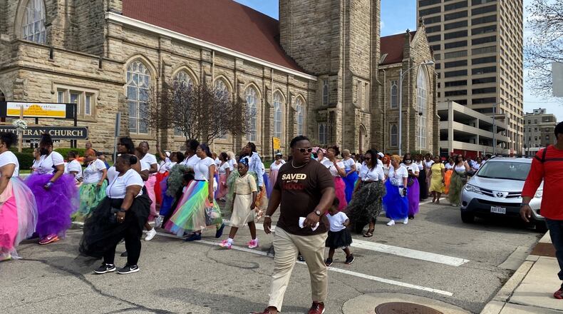 The Women In Tulle march, an initiative to bring women together for a purpose, went through downtown Dayton on Sunday, April 24, 2022. Proceeds will go to a local charity or organization. EILEEN McCLORY / STAFF