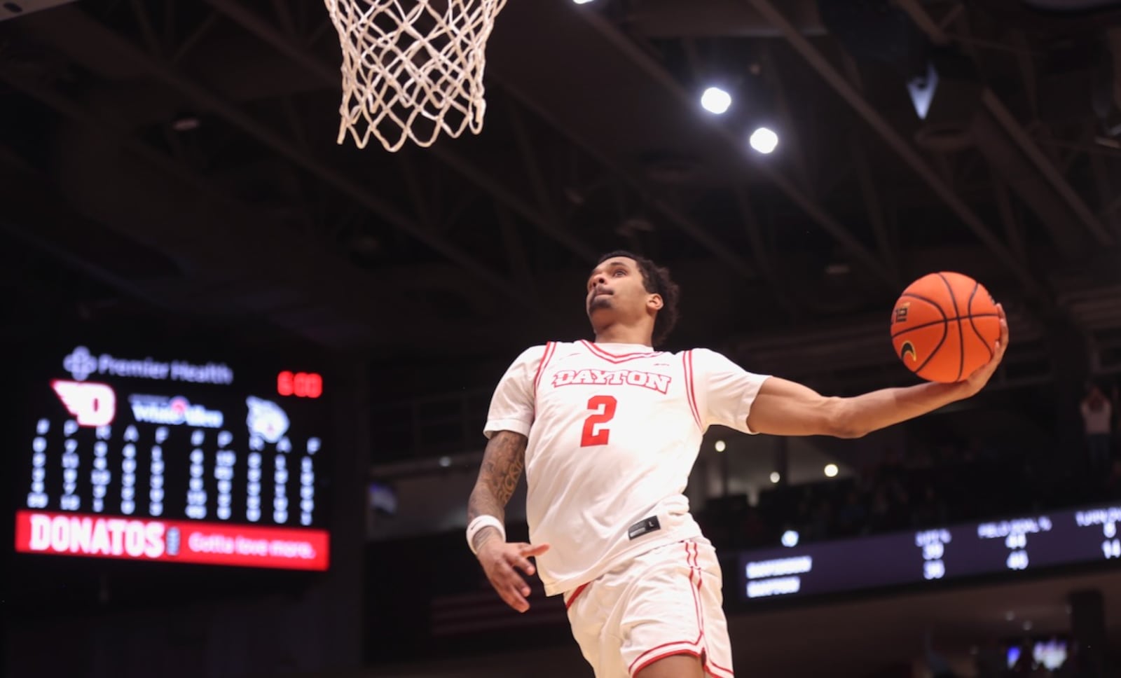 Dayton's De'Shayne Montgomery dunks in the second half against Davidson on Sunday, Feb. 15, 2026, at UD Arena. David Jablonski/Staff