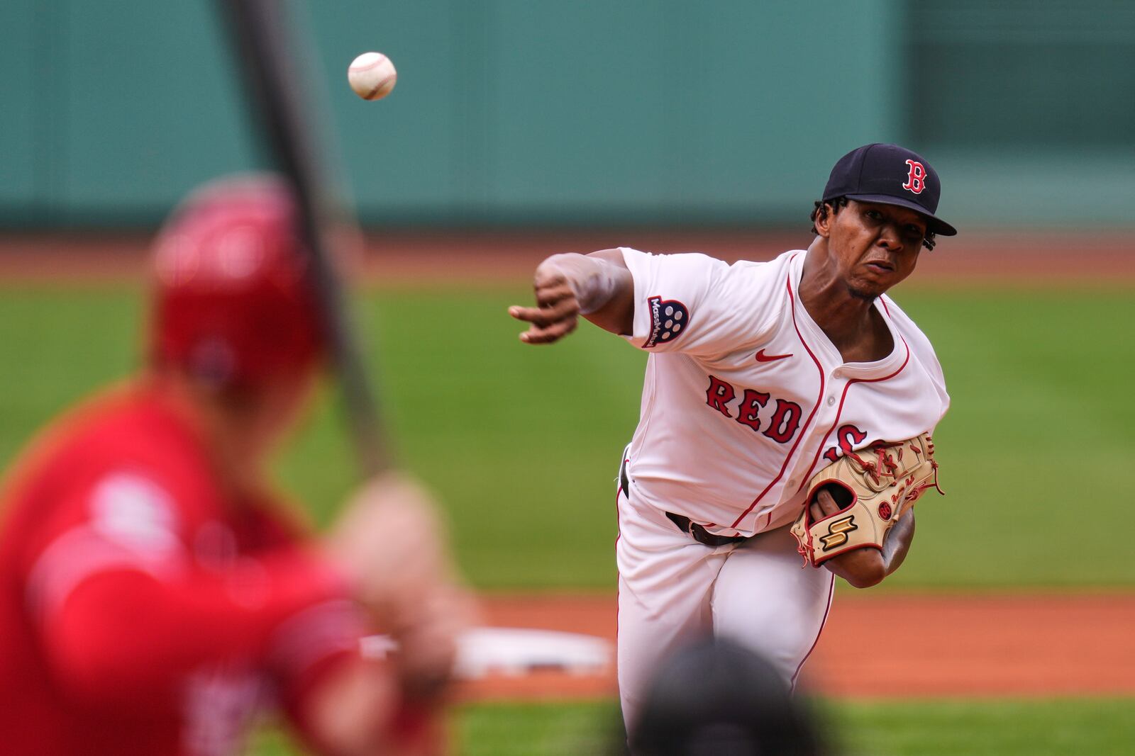 Boston Red Sox pitcher Brayan Bello delivers against the Cincinnati Reds during the fourth inning of a baseball game, a continuation of a game the night before which was suspended due to rain, Wednesday, July 2, 2025, at Fenway Park, in Boston. (AP Photo/Charles Krupa)