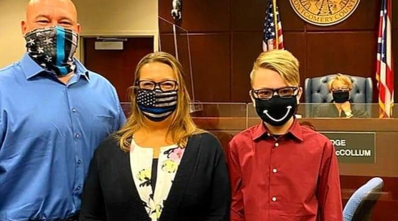 The Goldenbogen family after Renee and Michael officially adopted Jayden (far right). CONTRIBUTED