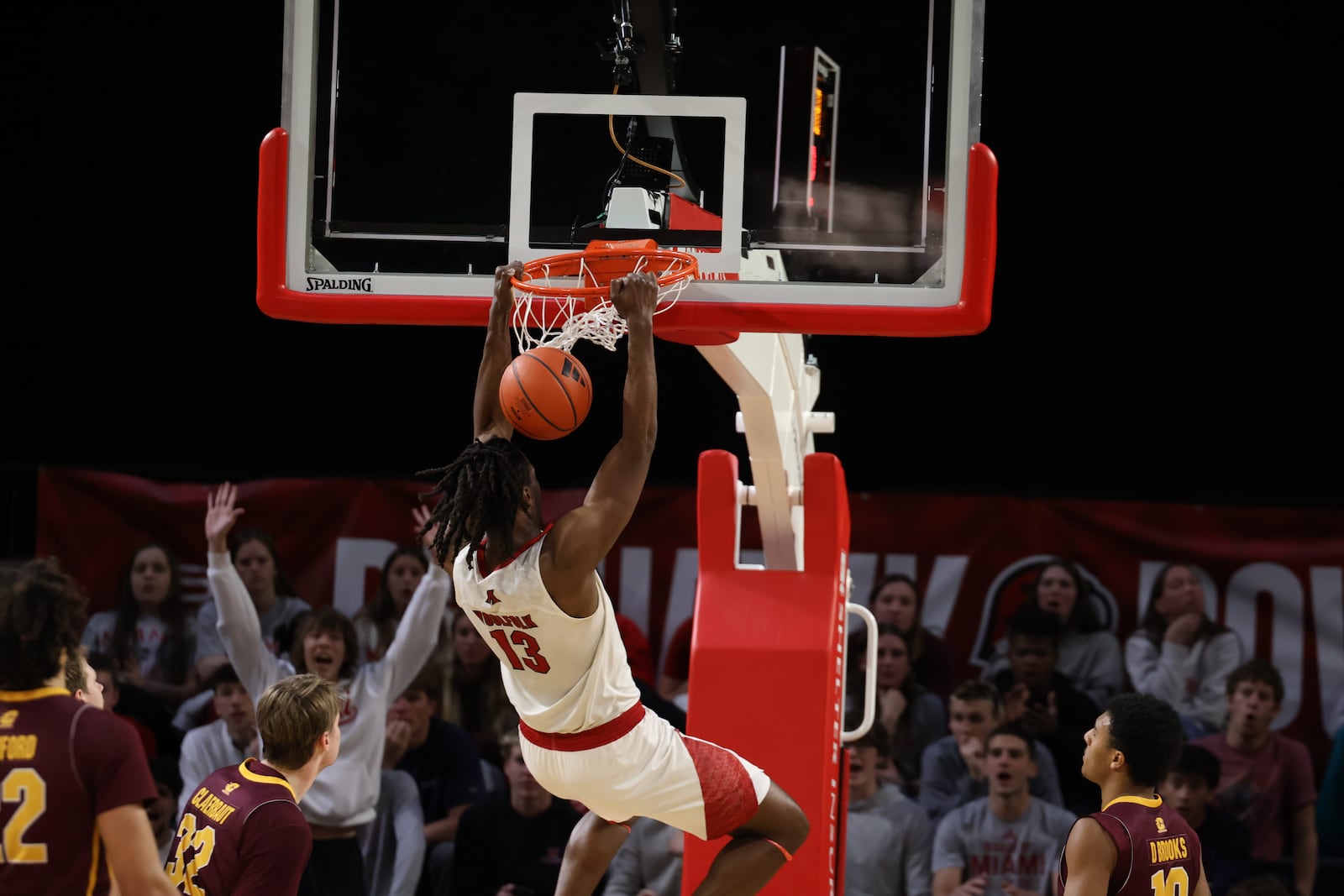 Miami’s Antwone Woolfolk slams one home against Central Michigan on Tuesday night at Millett Hall. ELIJAH COOK / CONTRIBUTED
