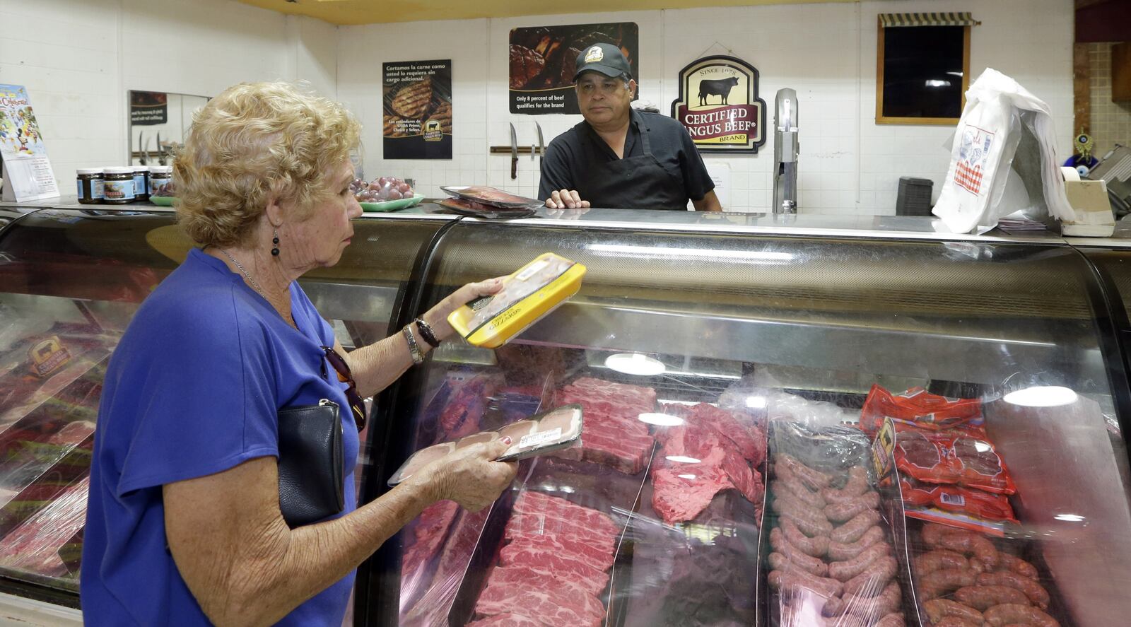 More than half of annual average U.S. household spending goes toward food, housing and transportation, according to the latest government figures. (AP Photo/Alan Diaz)