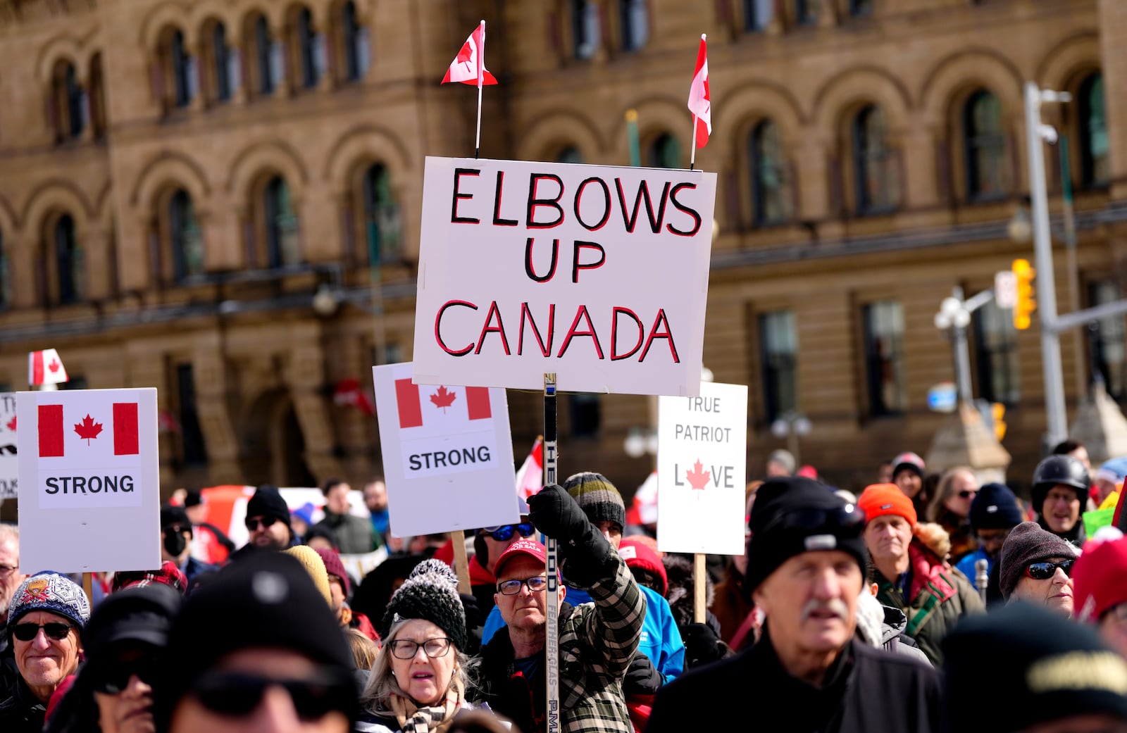 FILE - People rally in response to U.S. President Donald Trump's threats to Canadian sovereignty on Parliament Hill in Ottawa, March 9, 2025. (Justin Tang/The Canadian Press via AP File)