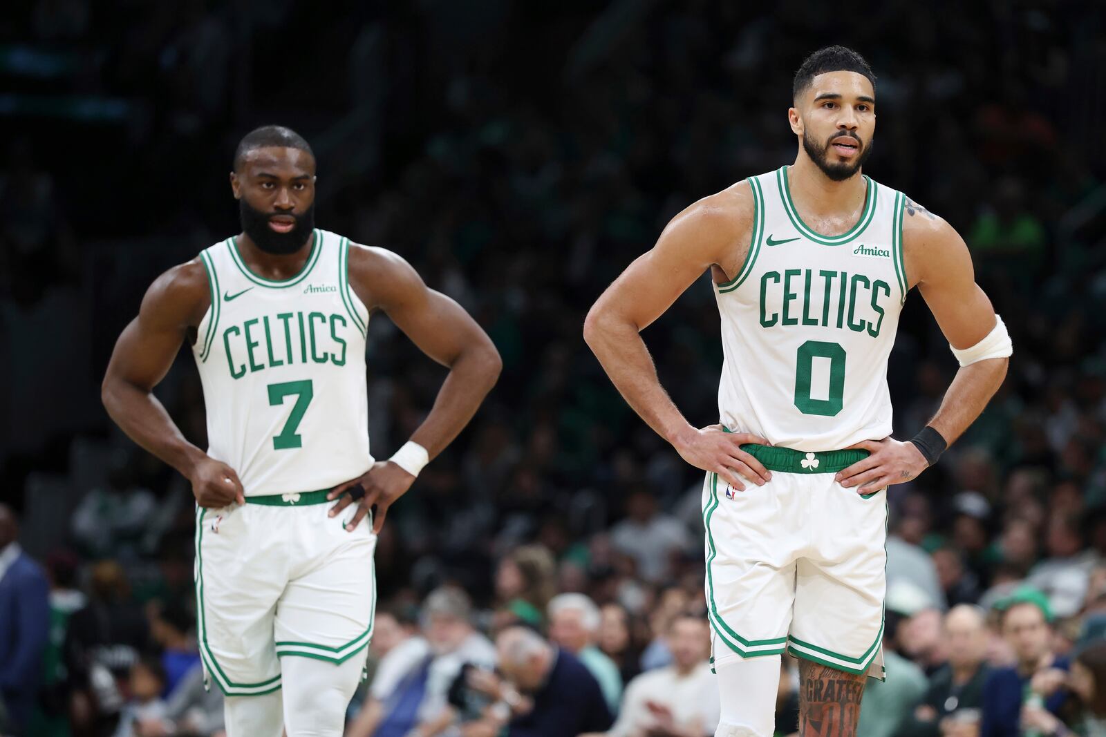 Boston Celtics' Jaylen Brown (7), left, and Jayson Tatum (0) play against the Orlando Magic during the first half in Game 1 of a first-round NBA playoff basketball series Sunday, April 20, 2025, in Boston. (AP Photo/Michael Dwyer)