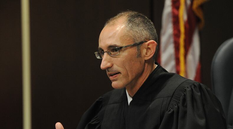 Montgomery County Probate Court Judge David D. Brannon talks about the importance of adoption during National Adoption Day Friday, Nov. 19, 2021. MARSHALL GORBY\STAFF
