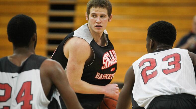 Vic Wyrick, a Sinclair Community College basketball player from Cincinnati, is back on the court the first time in a few years after breaking his back. JIM WITMER / STAFF