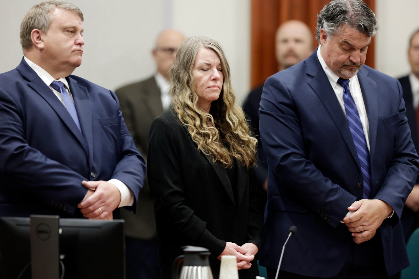 FILE - Lori Vallow Daybell stands and listens as the jury's verdict is read at the Ada County Courthouse in Boise, Idaho on Friday, May 12, 2023. Vallow Daybell faces up to life in prison without parole when she is expected to be sentenced Monday, July 31, in the murders of her two youngest children and a romantic rival. (AP Photo/Kyle Green, File)