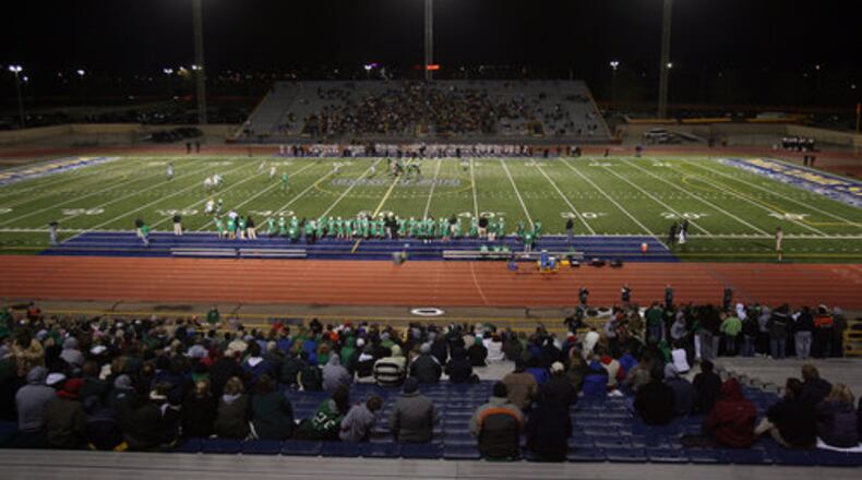 Welcome Stadium is lit up for a playoff football game.