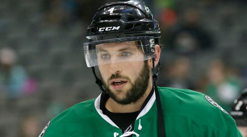 Dallas Stars defenseman Jason Demers (4) skates the ice during warm ups before an NHL hockey game against the San Jose Sharks Saturday, Oct. 31, 2015, in Dallas. (AP Photo/LM Otero)