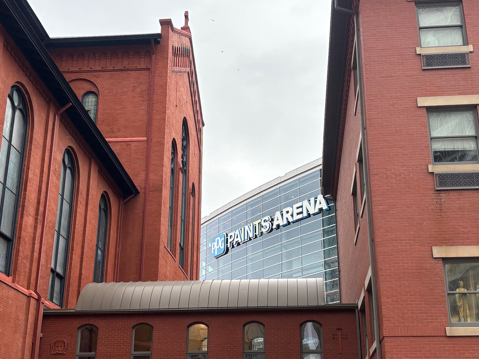 A view of PPG Paints Arena from the Epiphany Roman Catholic Church on Friday, March 13, 2026, in Pittsburgh. David Jablonski/Staff