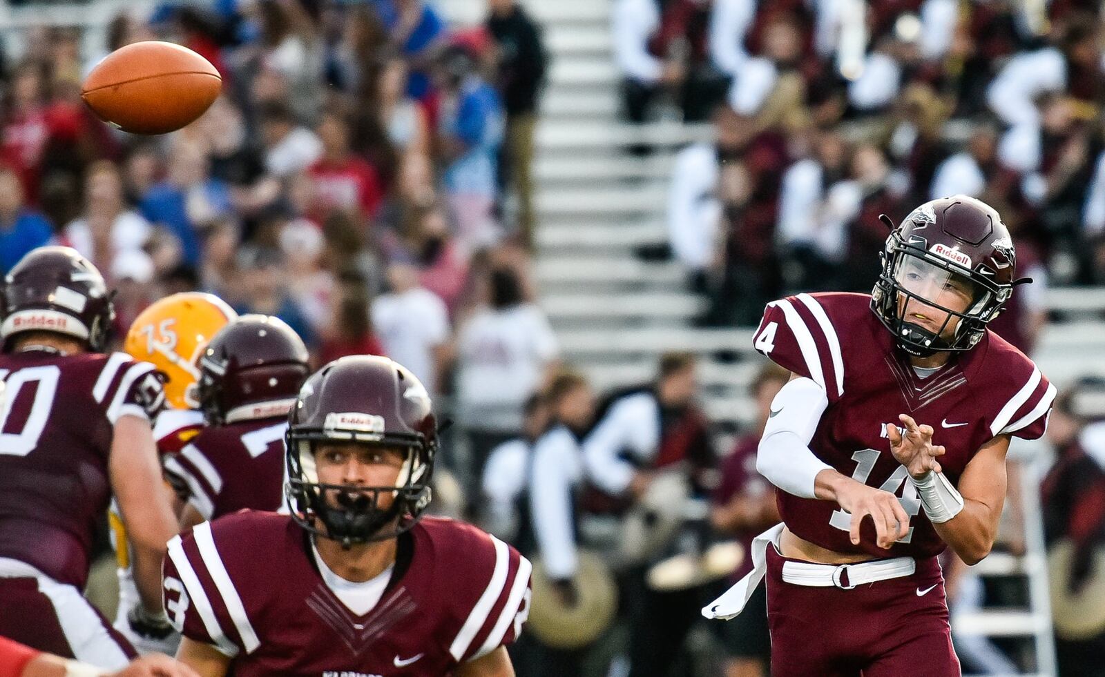 Lebanon quarterback Kyle Short (14) is well protected as he throws a pass against Fenwick on Friday night at VanDeGrift Stadium in Lebanon. NICK GRAHAM/STAFF
