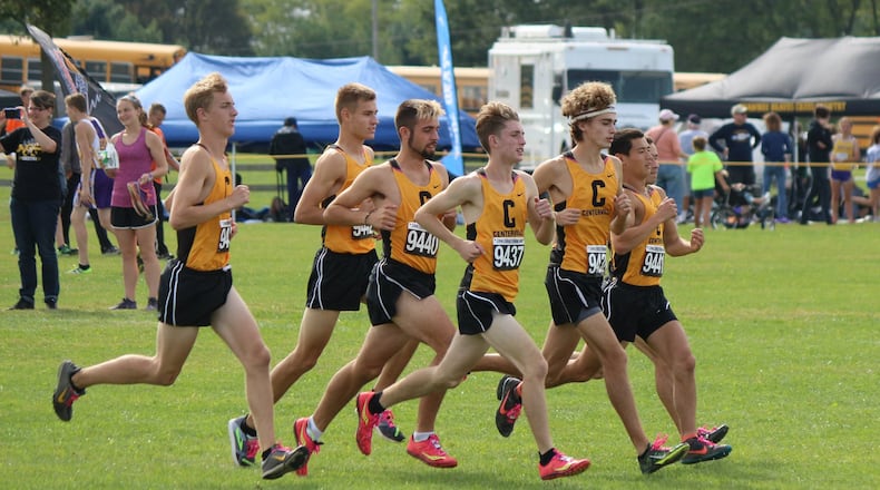 The Centerville Elks boys cross-country team, shown warming up at the Division I district championships, are part of a strong GWOC presence at the state cross-country championships in Hebron on Saturday. GREG BILLING / CONTRIBUTED