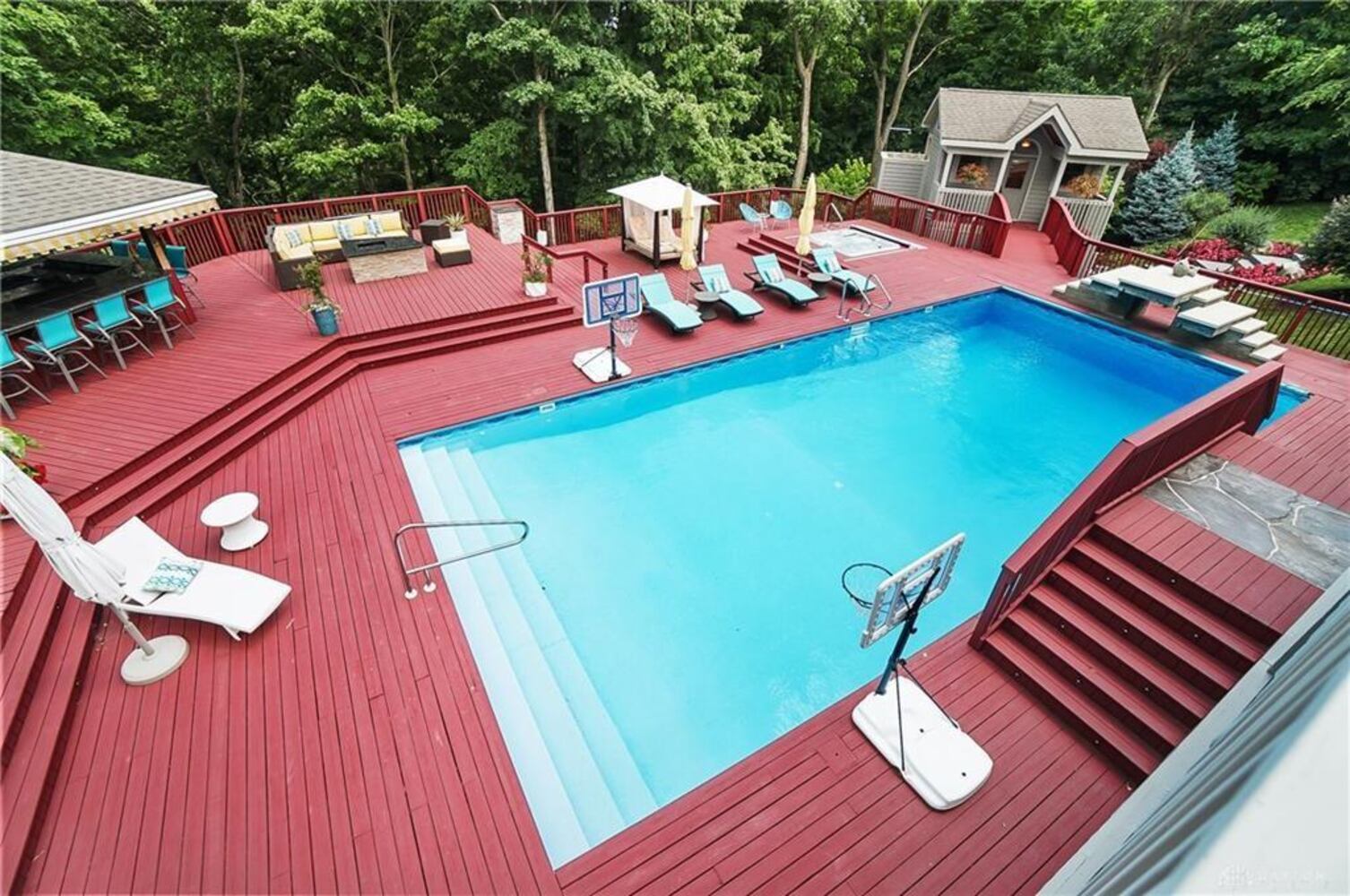 PHOTOS: Spectacular $1.8M luxury home on market with pool, golf simulator
